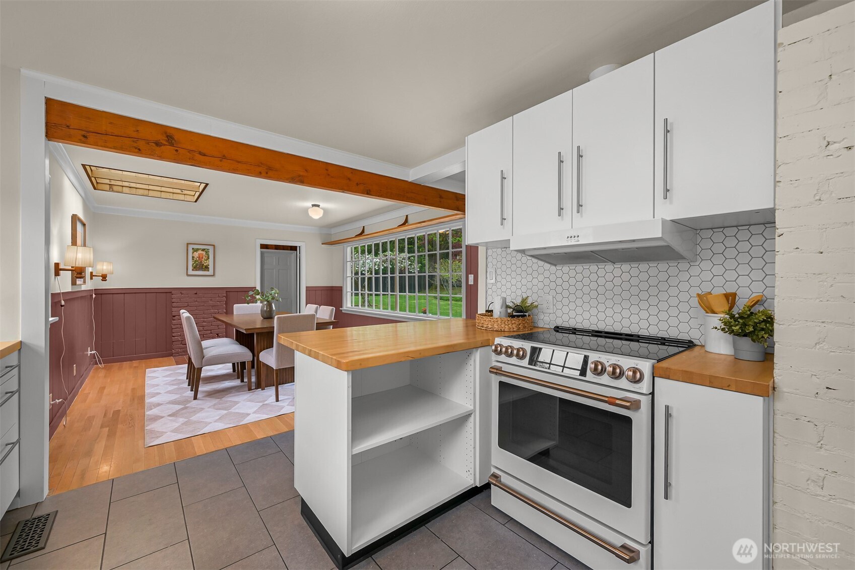 2814 40th Street Bellingham, WA 98229 - Photo 16 of 39 a kitchen with granite countertop a stove and a sink