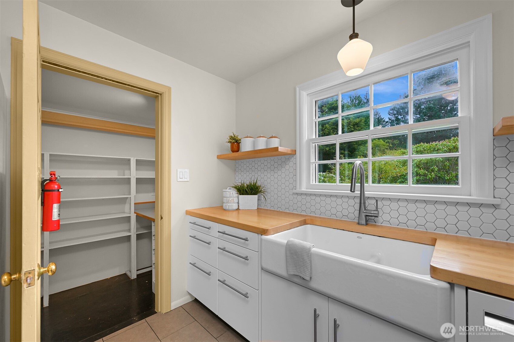 2814 40th Street Bellingham, WA 98229 - Photo 17 of 39 a kitchen with a sink and a window
