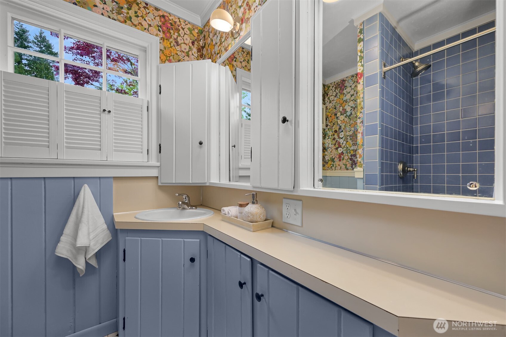 2814 40th Street Bellingham, WA 98229 - Photo 28 of 39 a bathroom with a granite countertop sink and a window