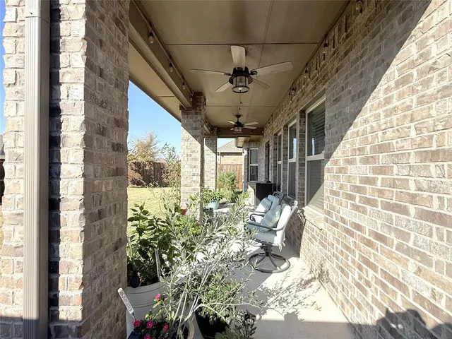 a view of porch with seating space