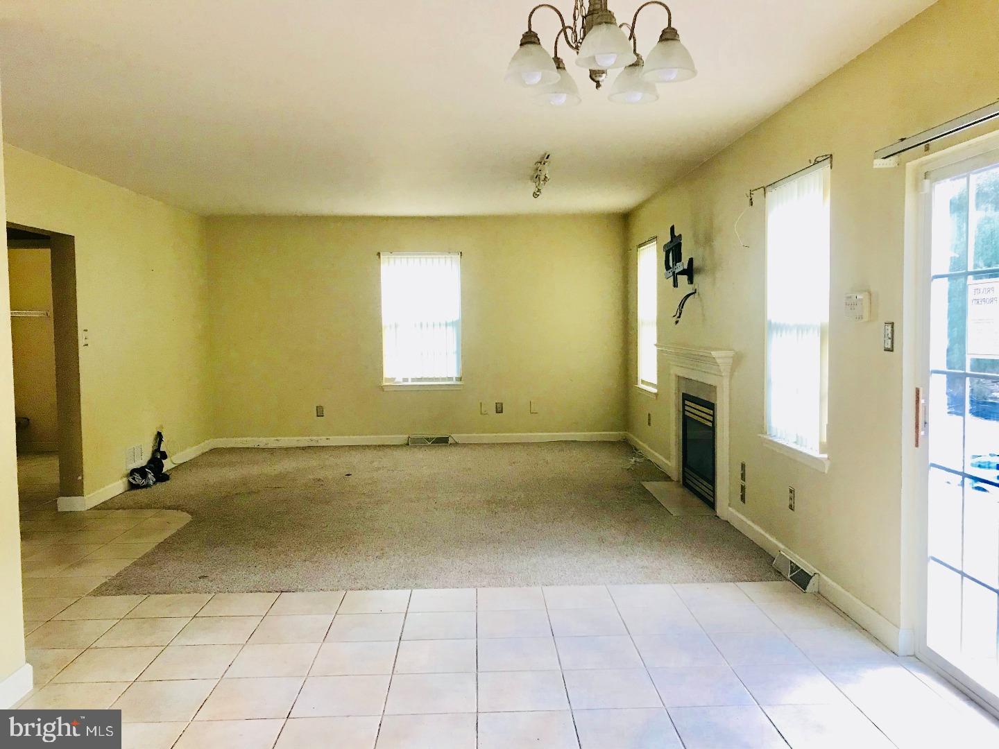 1185 Cedar Top Road Reading, PA 19607 - Photo 8 of 24 a view of empty room with windows