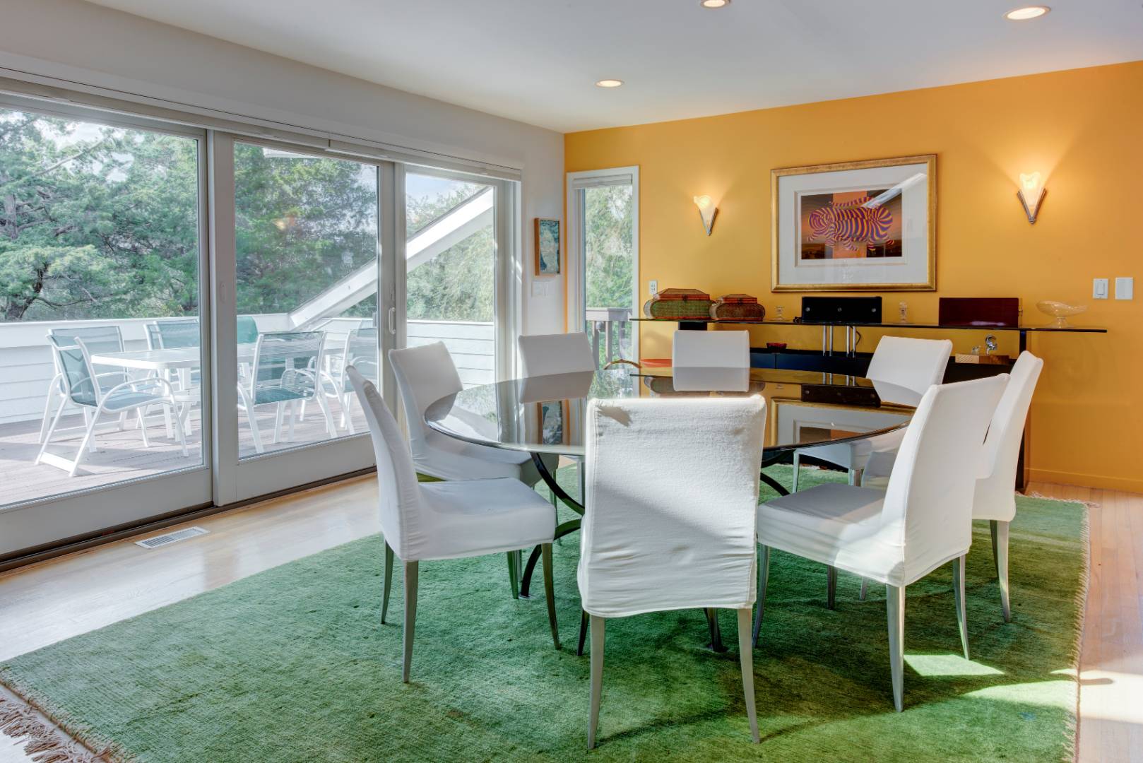 32 Reynolds Drive Westhampton Beach, NY 11978 - Photo 5 of 17 a dining room with furniture and a floor to ceiling window