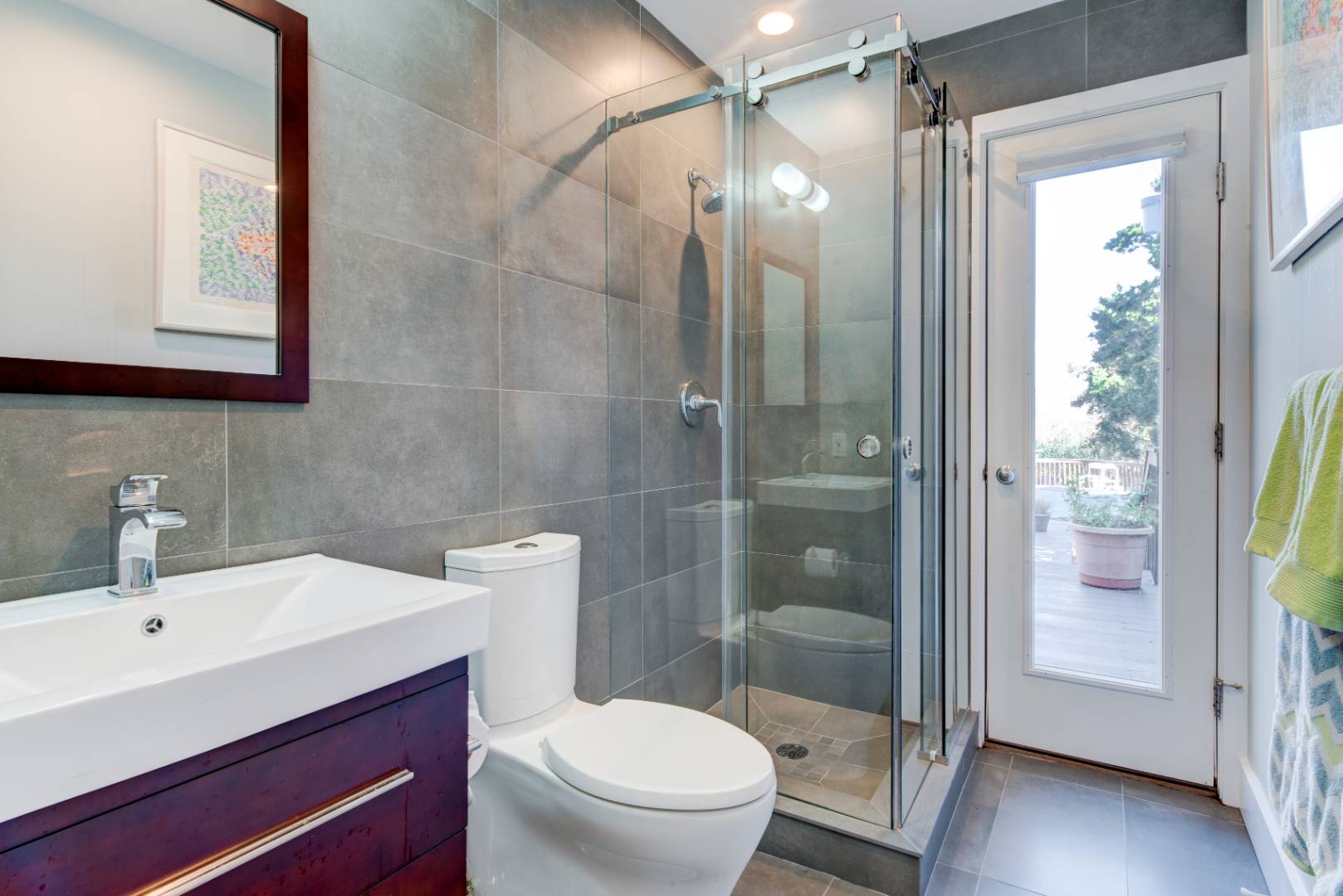 32 Reynolds Drive Westhampton Beach, NY 11978 - Photo 10 of 17 a bathroom with a sink a toilet and shower