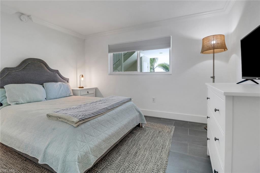 309 Goodlette-Frank Road, Unit 304A Naples, FL 34102 - Photo 9 of 10 Secondary bedroom with en-suite bathroom