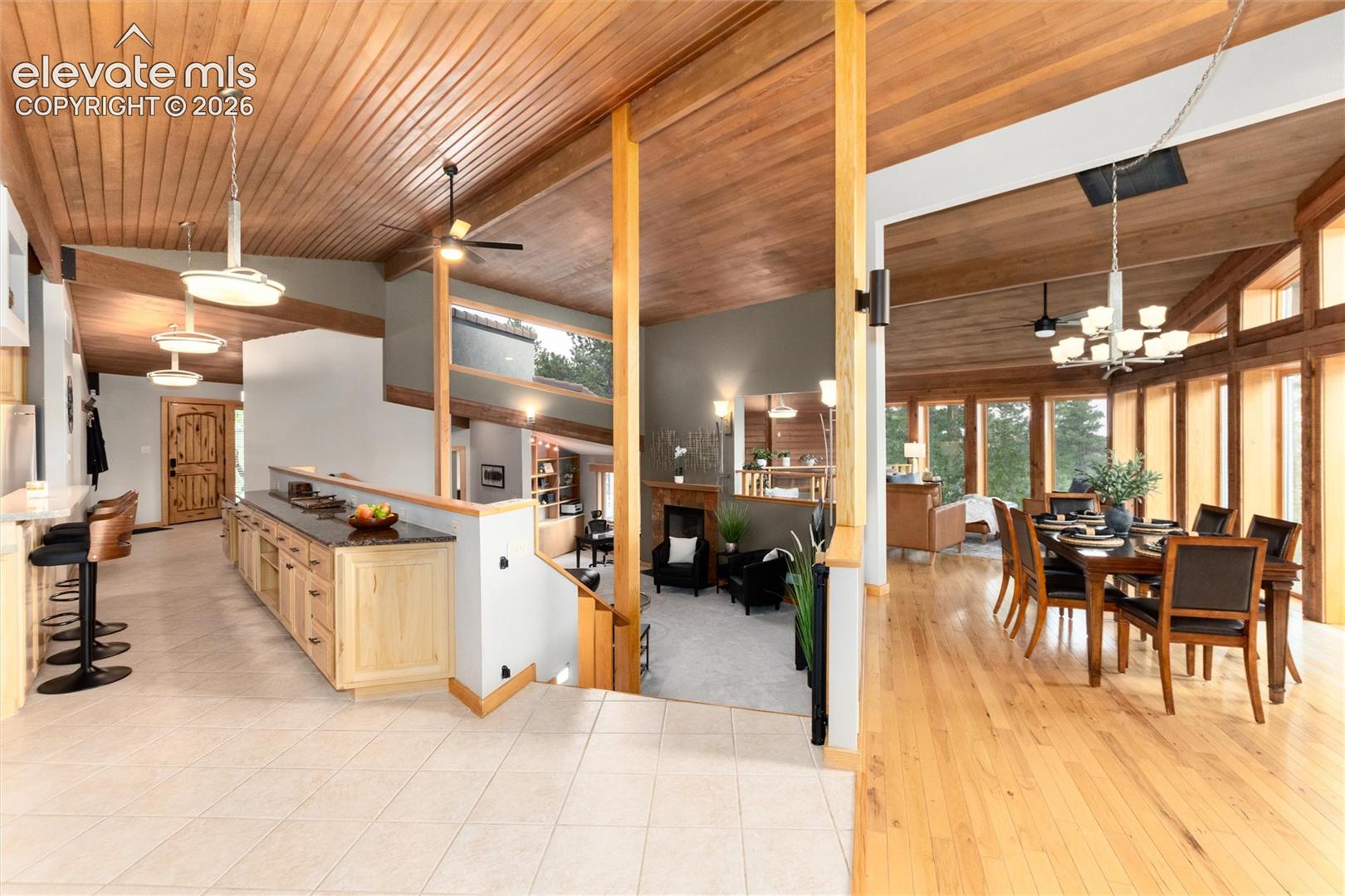 View of kitchen, living room, and dining area. 