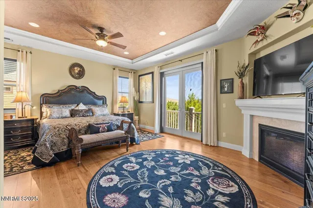 a bedroom with a bed and a fireplace