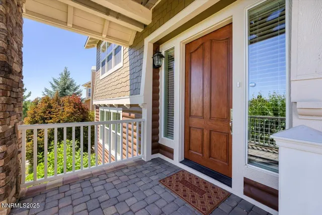 a view of balcony with wooden floor
