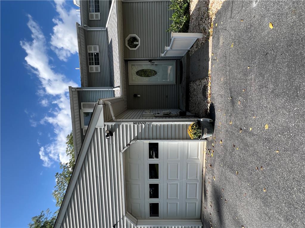 896 Briarstone Road Bethlehem, PA 18017 - Photo 1 of 37 Multi-level townhouse exterior features neutral siding and an attached single-car garage.