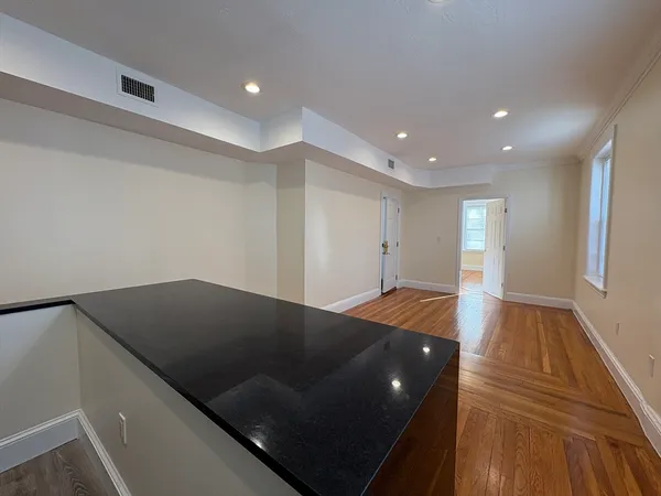 a living room with a bed