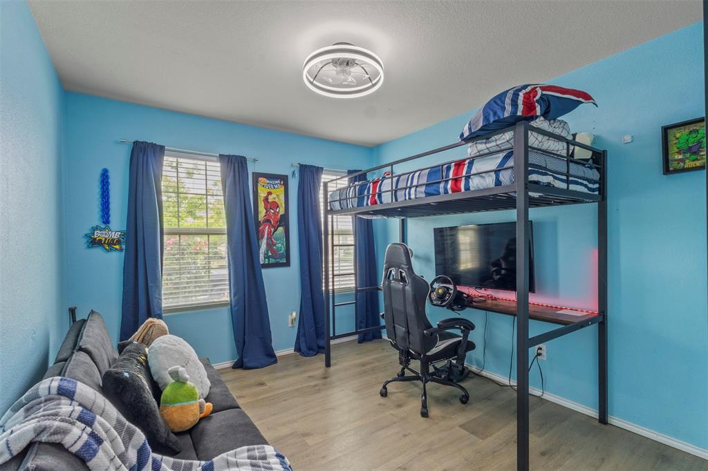 217 Anvil Drive Haslet, TX 76052 - Photo 11 of 18 a view of a livingroom with furniture and windows