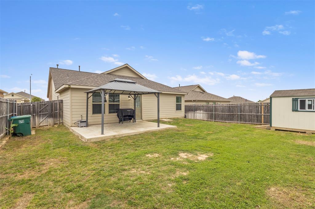 217 Anvil Drive Haslet, TX 76052 - Photo 16 of 18 a house view with a garden space