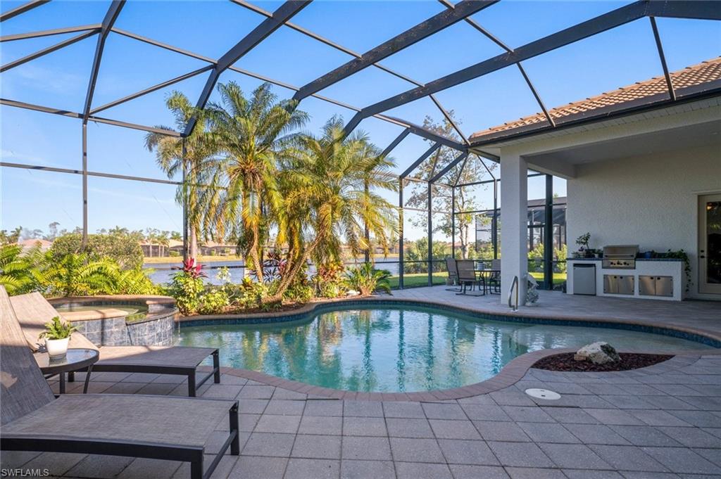 19415 La Serena Drive Estero, FL 33967 - Photo 1 of 49 a view of a swimming pool with a patio