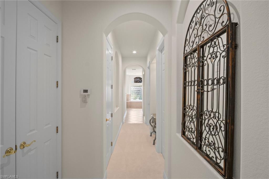 19415 La Serena Drive Estero, FL 33967 - Photo 18 of 49 a bathroom with a bathtub