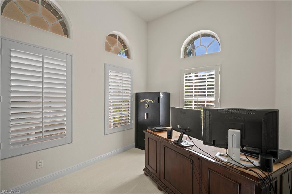19415 La Serena Drive Estero, FL 33967 - Photo 22 of 49 a view of a workspace with a window