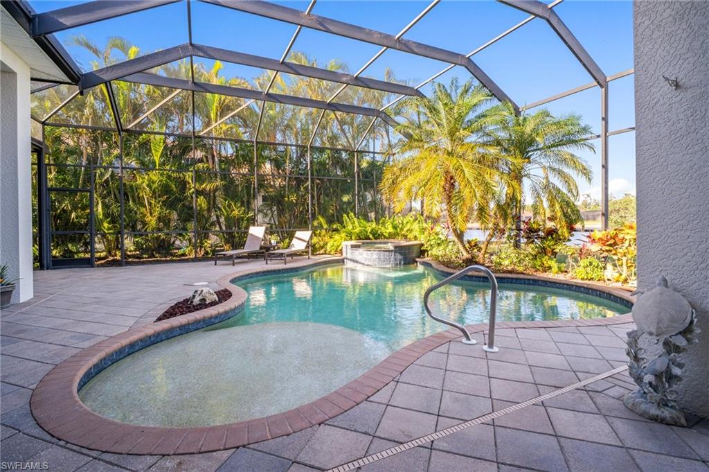 19415 La Serena Drive Estero, FL 33967 - Photo 31 of 49 a view of an outdoor space with swimming pool