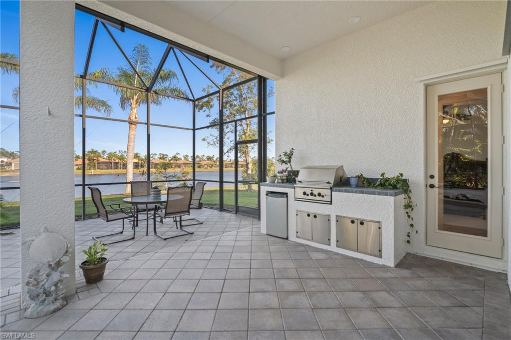 19415 La Serena Drive Estero, FL 33967 - Photo 33 of 49 a view of a chairs and table in a patio