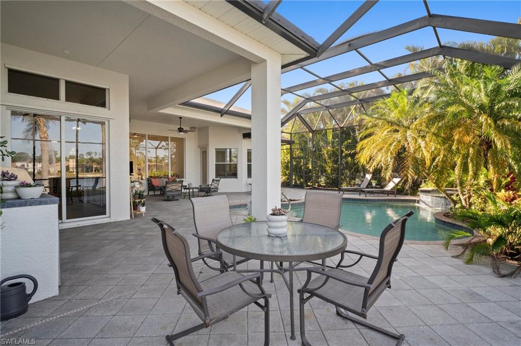 19415 La Serena Drive Estero, FL 33967 - Photo 34 of 49 a view of an outdoor dining space with a patio