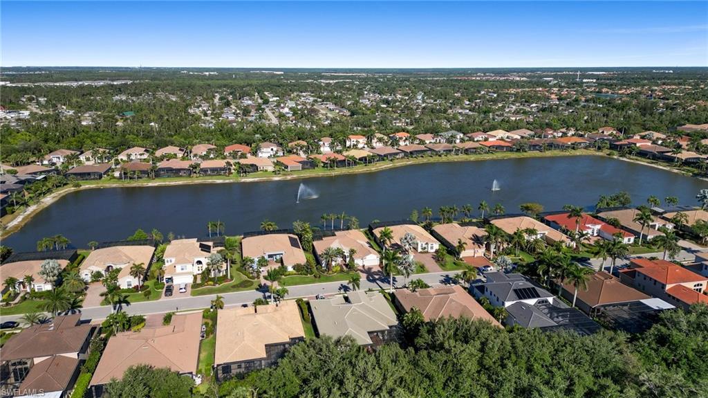 19415 La Serena Drive Estero, FL 33967 - Photo 40 of 49 an aerial view of residential houses with outdoor space