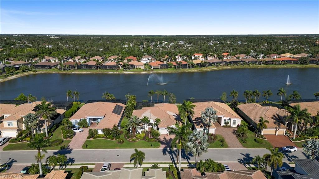 19415 La Serena Drive Estero, FL 33967 - Photo 4 of 49 an aerial view of residential houses with outdoor space