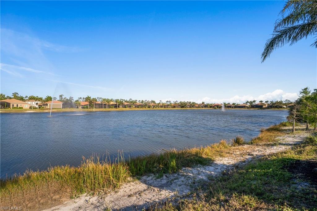 19415 La Serena Drive Estero, FL 33967 - Photo 42 of 49 a view of a lake with outdoor space