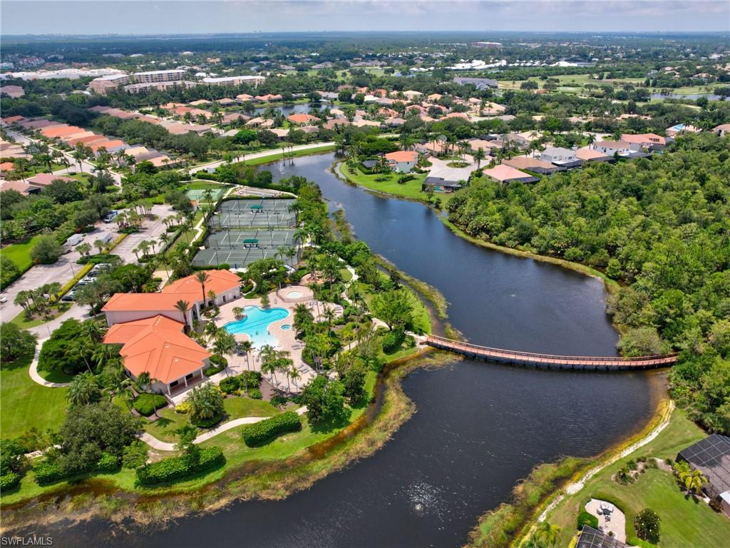 19415 La Serena Drive Estero, FL 33967 - Photo 46 of 49 an aerial view of a house with a lake view