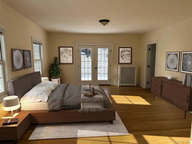 a bed sitting in a bedroom next to a window