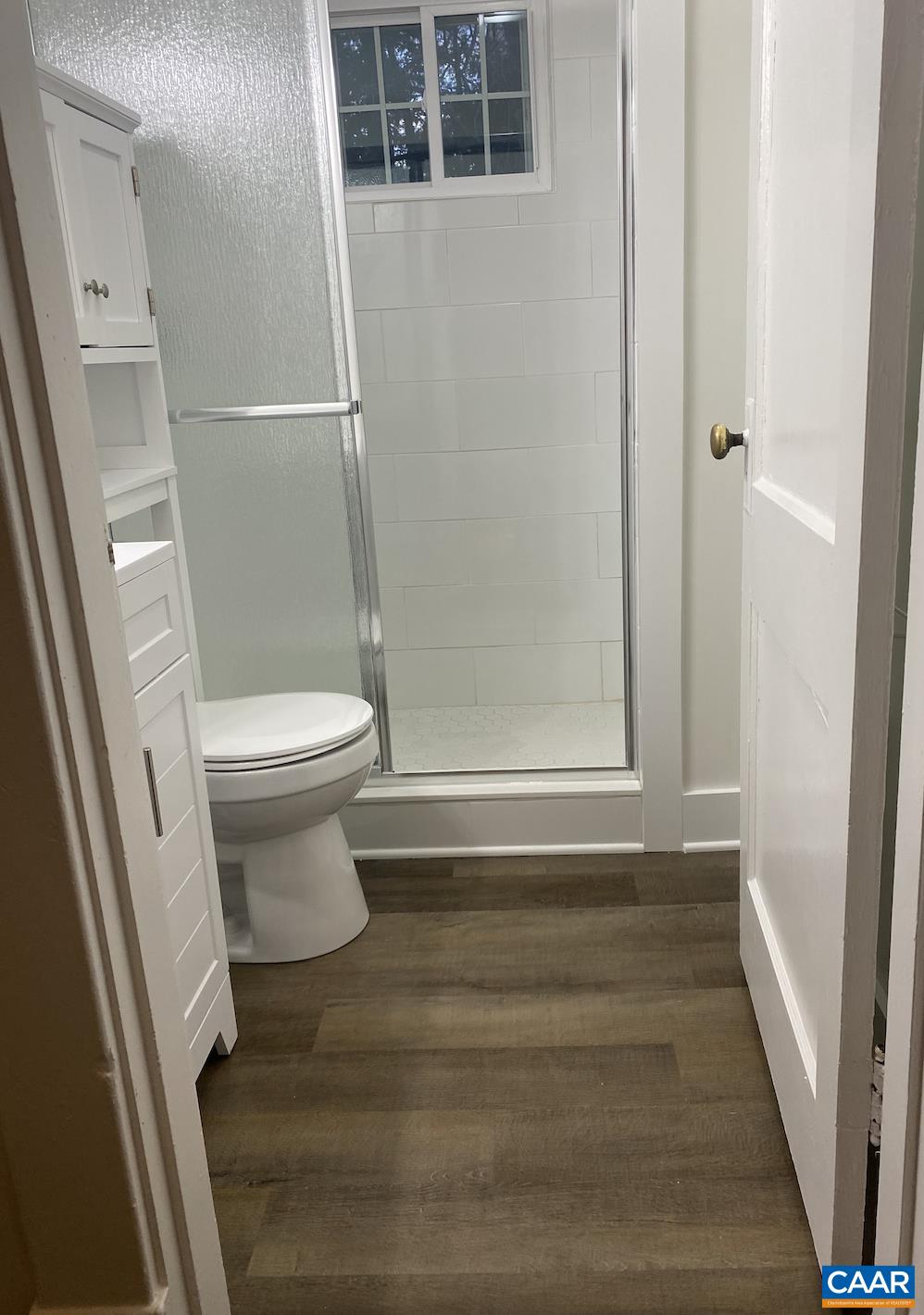 513 Valley Road Charlottesville, VA 22903 - Photo 17 of 22 a bathroom with a toilet and a shower