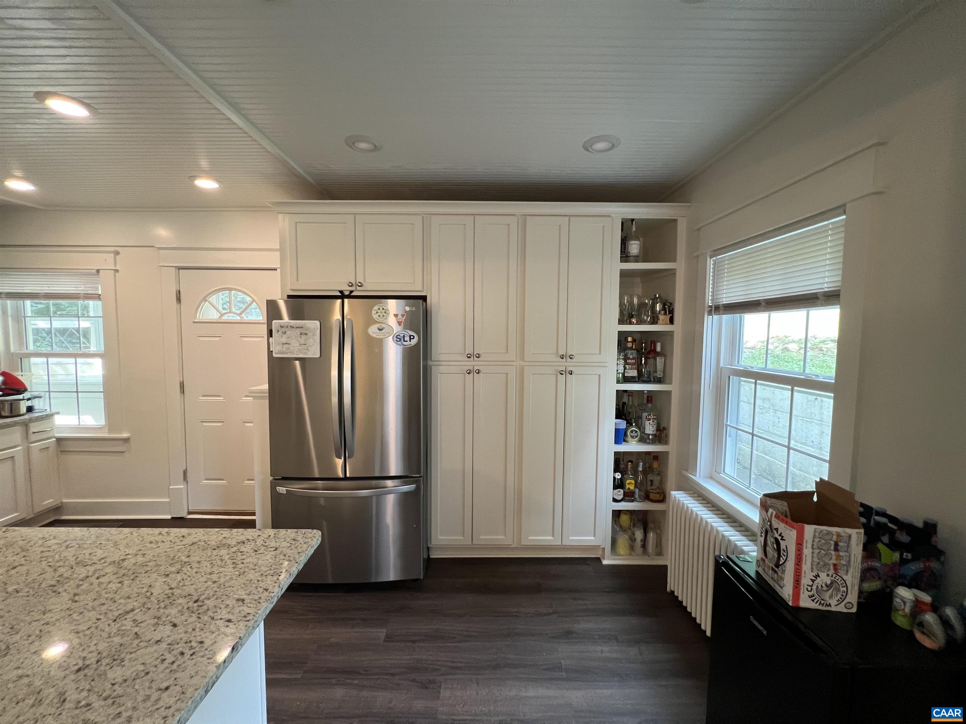 513 Valley Road Charlottesville, VA 22903 - Photo 5 of 22 a kitchen with stainless steel appliances granite countertop a refrigerator and a sink