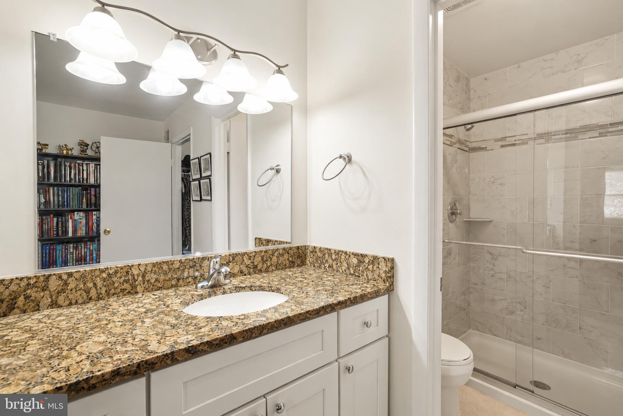13203 Delaney Road Woodbridge, VA 22193 - Photo 26 of 43 Elegant bathroom with modern finishes.