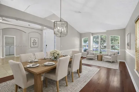 a kitchen with granite countertop a sink and a window