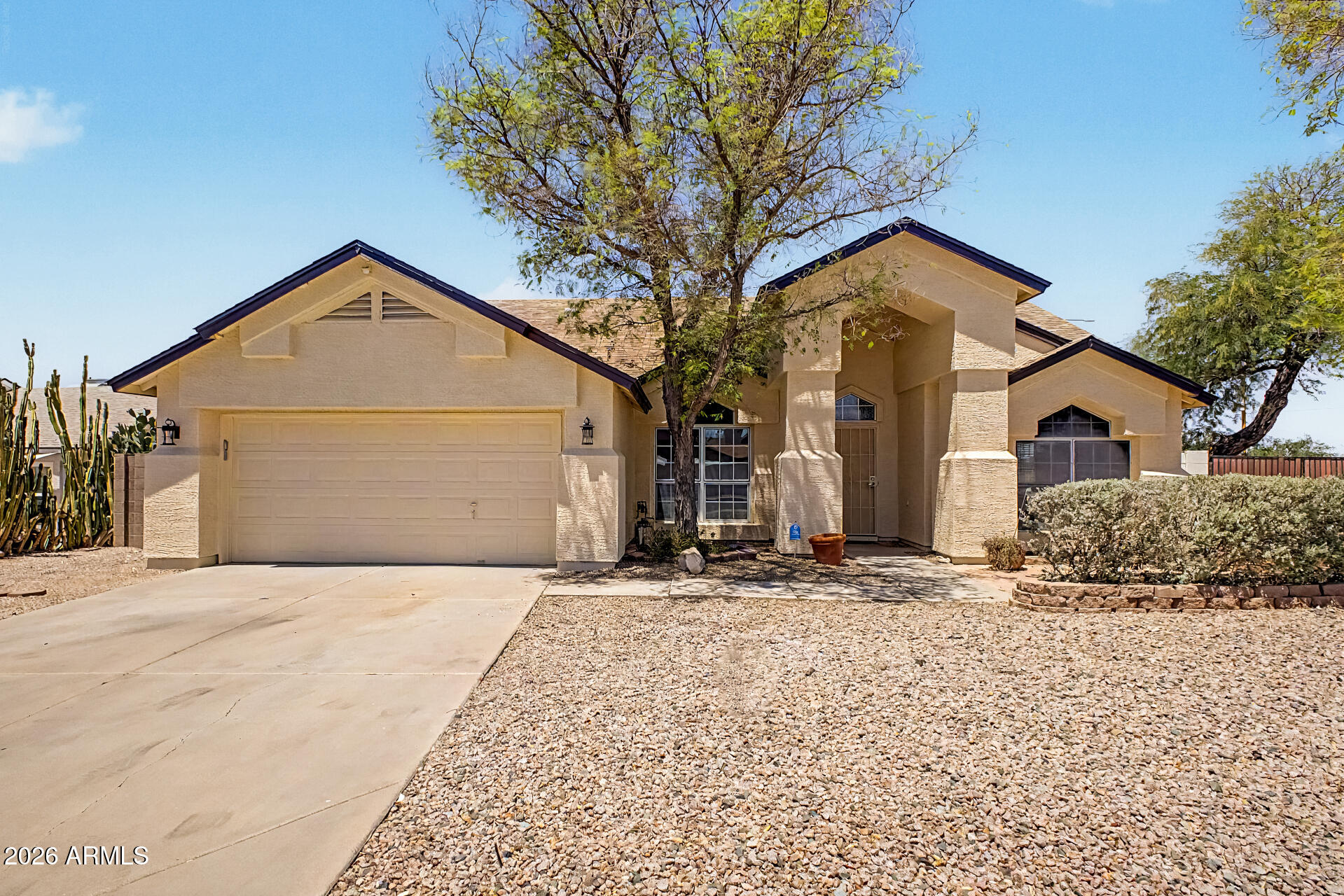 2762 North Ricardo Mesa, AZ 85215 - Photo 2 of 38 a front view of a house with a yard