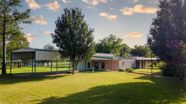 a house view with a garden space