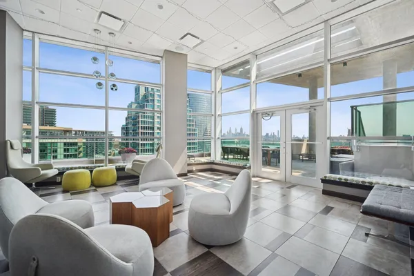 a balcony with furniture and outdoor view