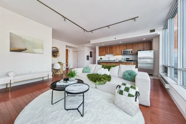 a living room with furniture and a table