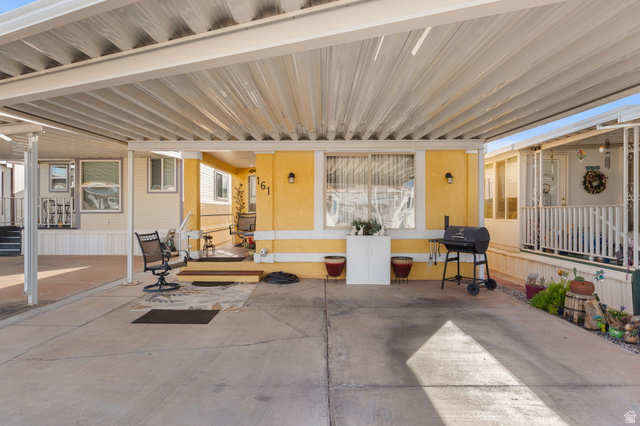 1225 North Dixie Downs Road, Unit 161 St. George, UT 84770 - Photo 20 of 21 Covered concrete carport with ample space