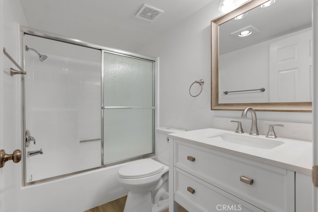 4201 Las Virgenes Road, Unit 206 Calabasas, CA 91302 - Photo 29 of 44 a bathroom with a sink a toilet and shower