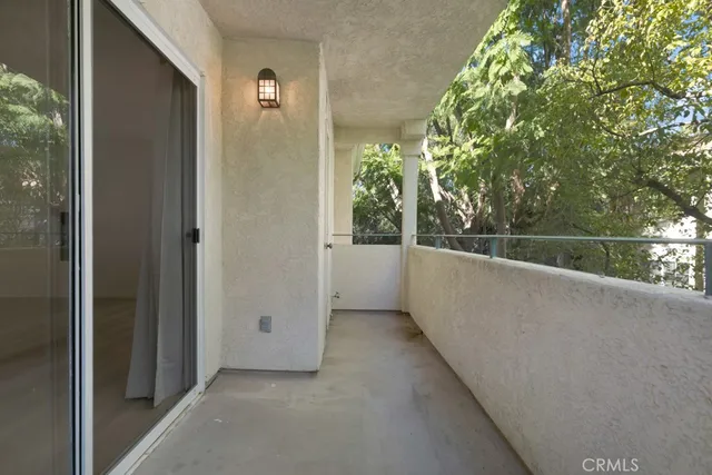 a view of a balcony with outdoor space