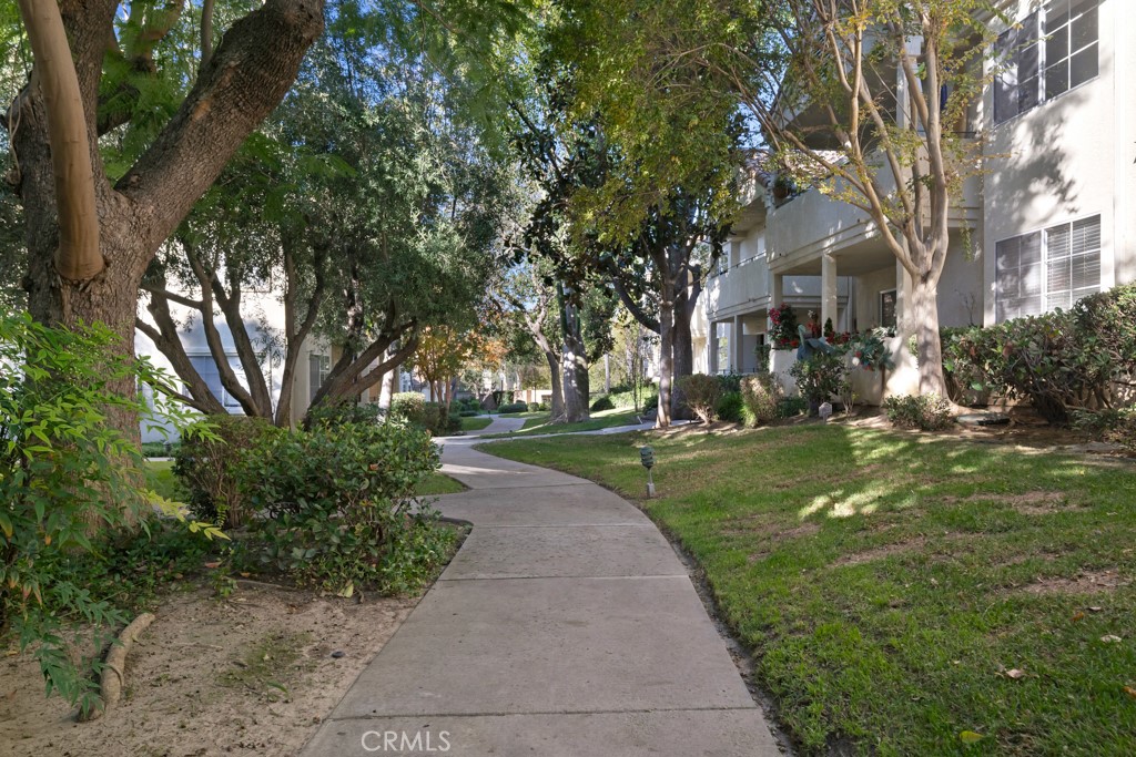 4201 Las Virgenes Road, Unit 206 Calabasas, CA 91302 - Photo 37 of 44 a backyard of a house with lots of green space