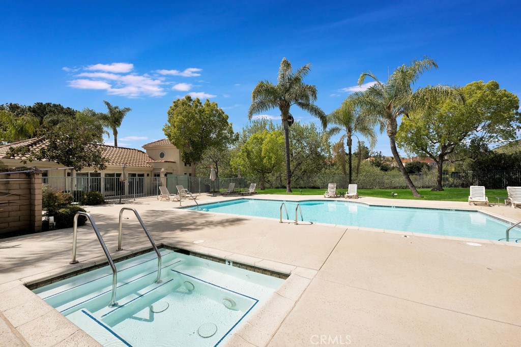 4201 Las Virgenes Road, Unit 206 Calabasas, CA 91302 - Photo 40 of 44 a view of a patio with swimming pool