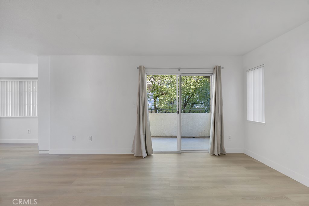 4201 Las Virgenes Road, Unit 206 Calabasas, CA 91302 - Photo 10 of 44 a view of an empty room with a window