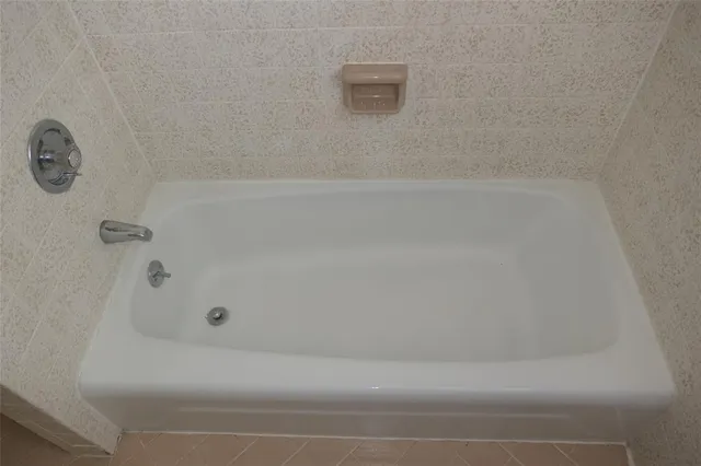 a bathroom with a bathtub