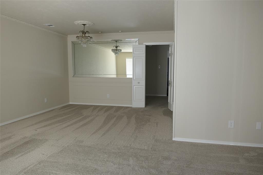 6317 Rincon Way Dallas, TX 75214 - Photo 8 of 32 an empty room with a empty space and windows