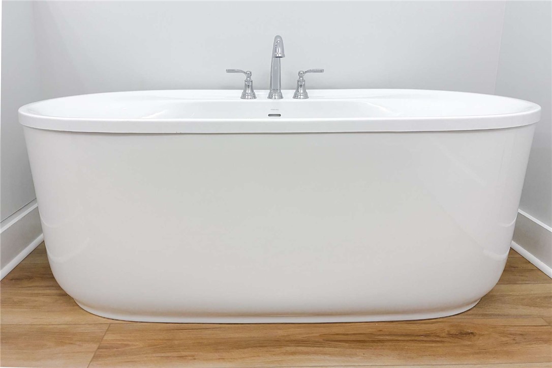 2515 Highway 29 Anderson, SC 29621 - Photo 26 of 38 Indulge in relaxation with this elegant freestanding bathtub set against a warm wood floor.