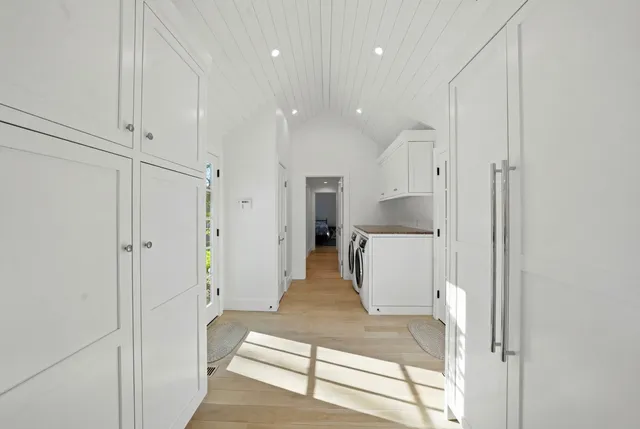 a view of a kitchen with a stove and a refrigerator