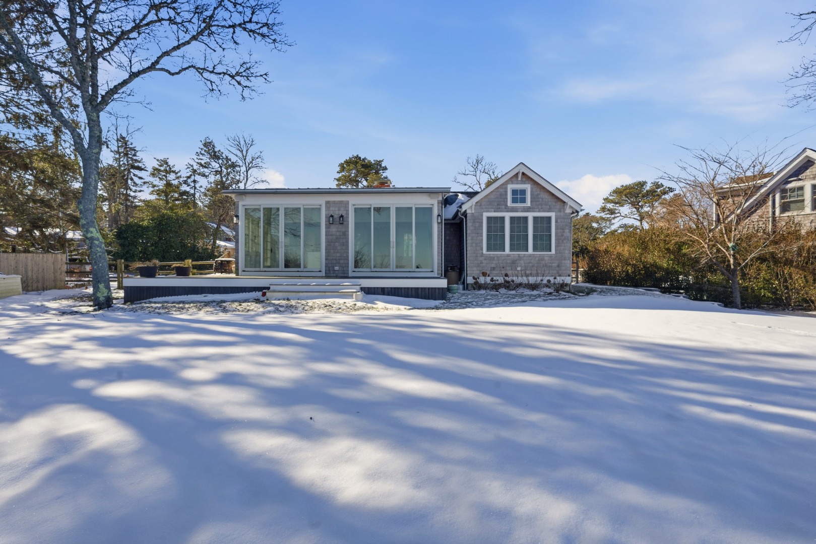 10 Fowler Avenue Edgartown, MA 02539 - Photo 3 of 20 a front view of a house with a garden
