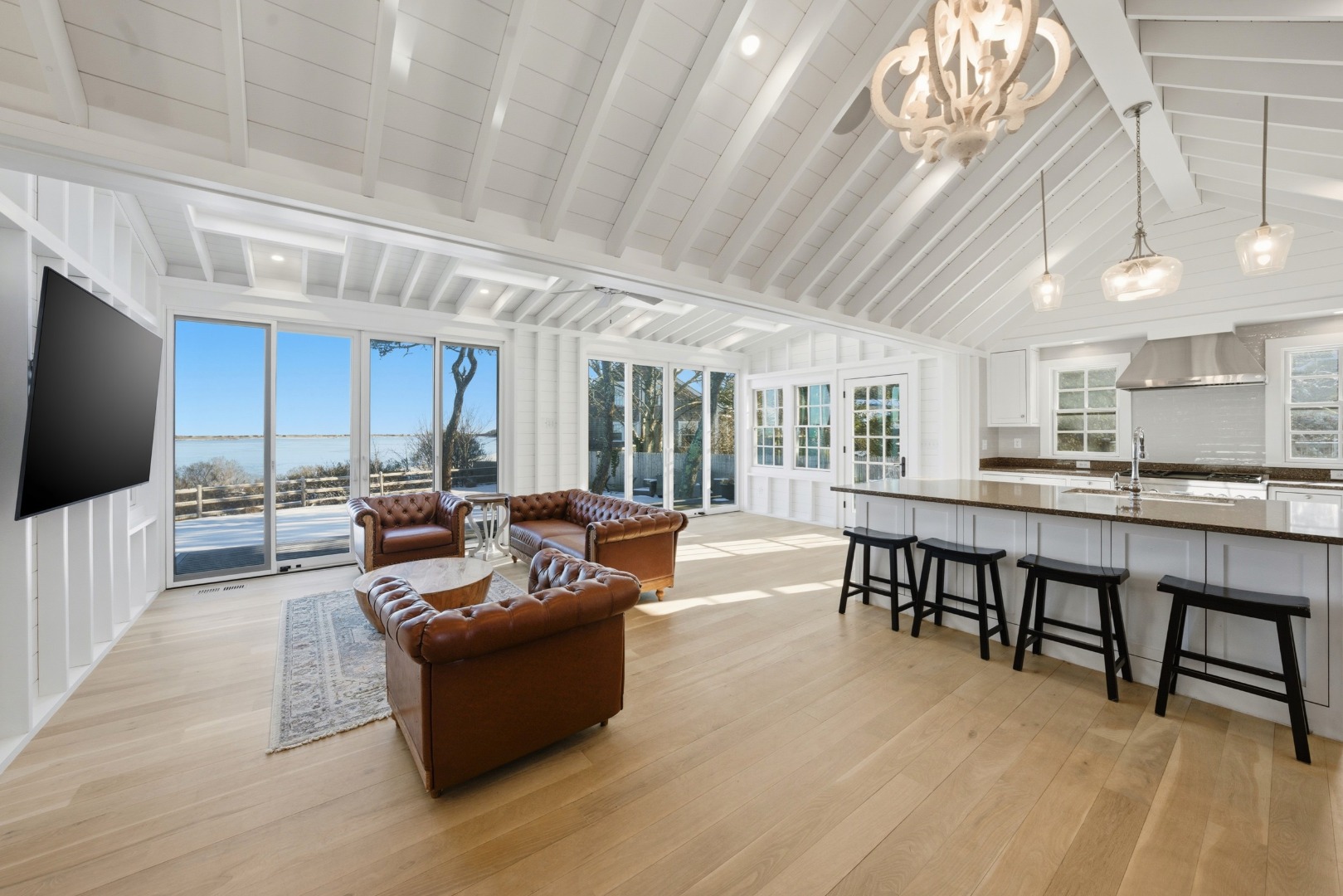 10 Fowler Avenue Edgartown, MA 02539 - Photo 4 of 20 a living room with furniture and a flat screen tv