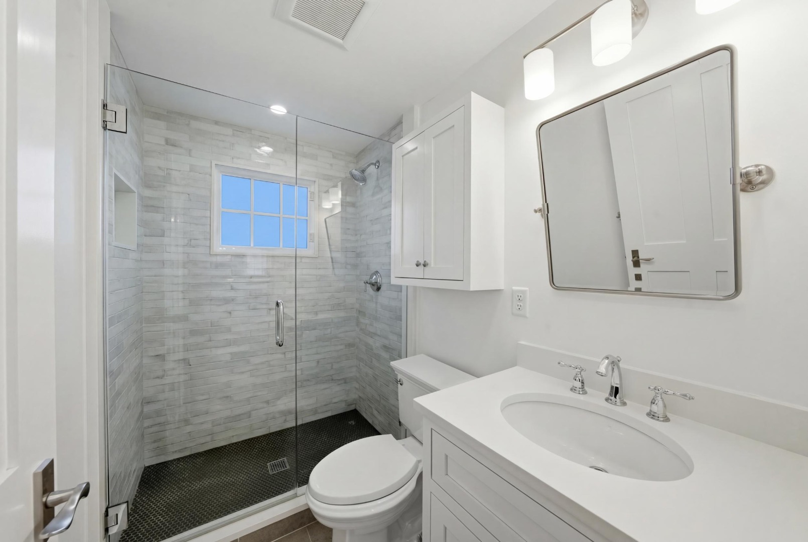 10 Fowler Avenue Edgartown, MA 02539 - Photo 10 of 20 a bathroom with a sink a toilet and shower