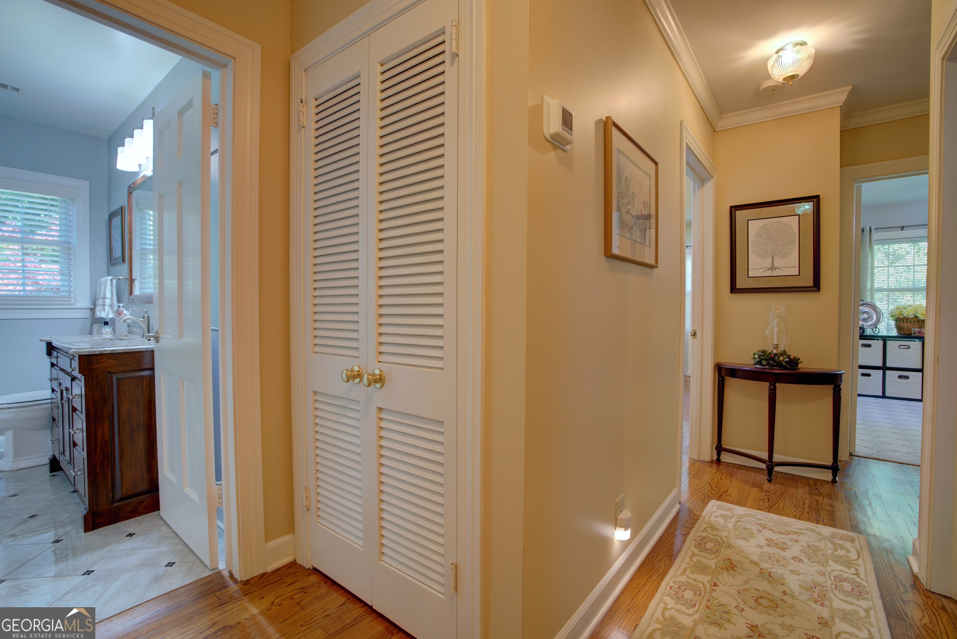 204 Green View Road Southwest Rome, GA 30165 - Photo 34 of 62 a view of a hallway with wooden floor and furniture