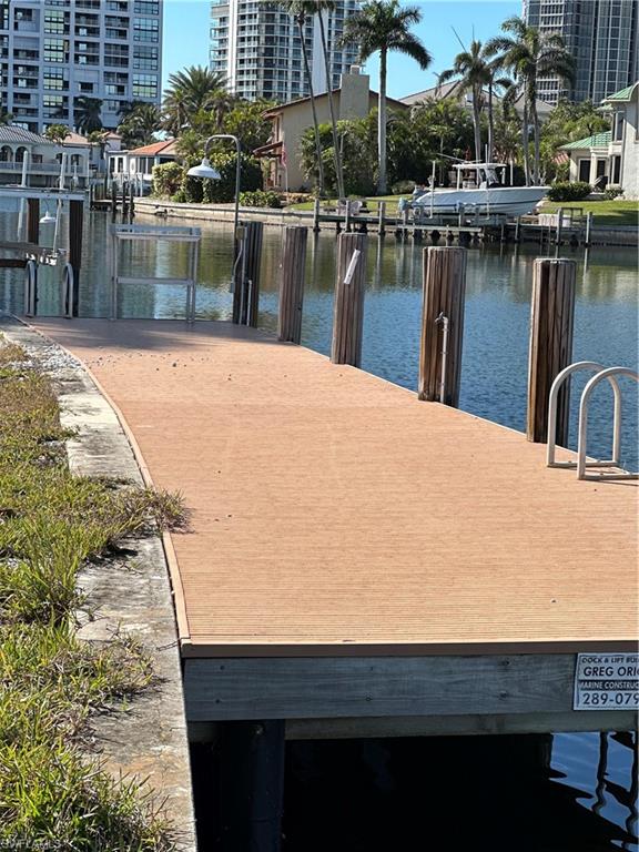 341 Devils Bight Naples, FL 34103 - Photo 14 of 16 a view of a lake