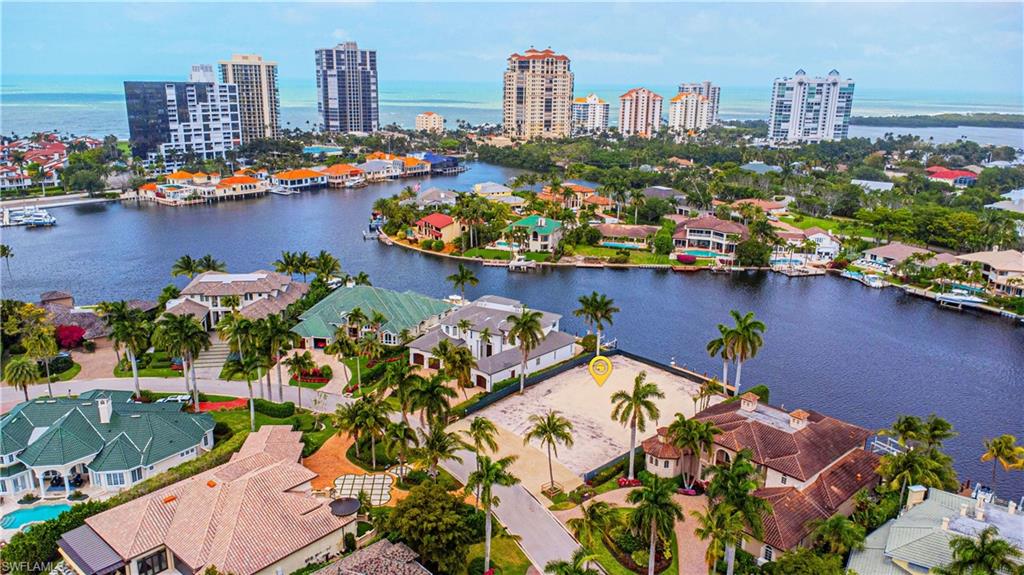 341 Devils Bight Naples, FL 34103 - Photo 4 of 16 an aerial view of a city